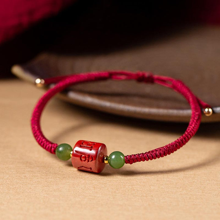 Armband aus geflochtenem Seil von Buddha Stones Tibetan Cinnabar Om Mani Padme Hum mit Gravur und Segen