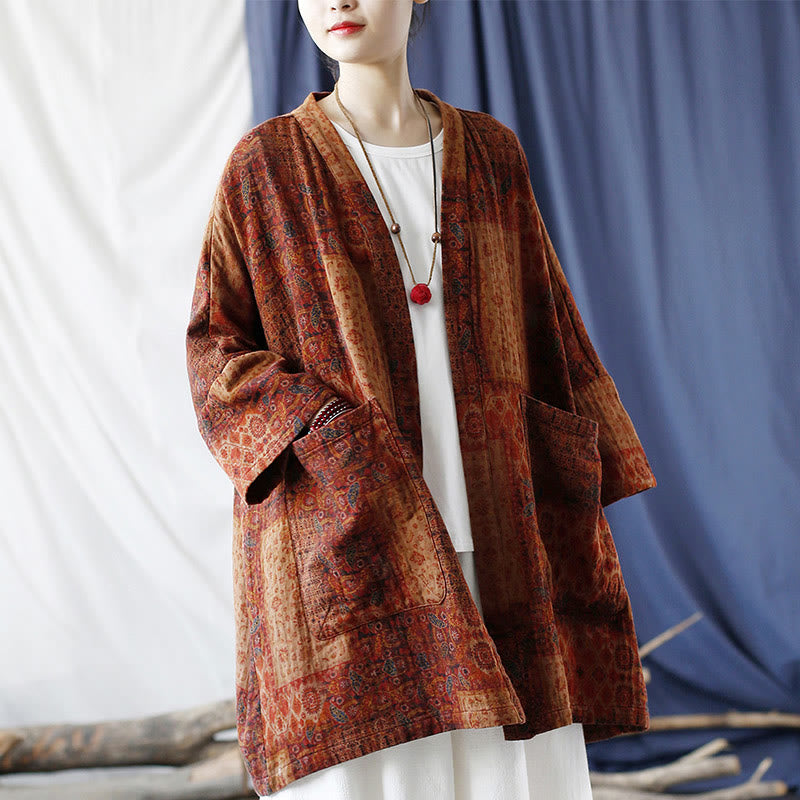 Buddha Stones – Orangefarbene Baumwolljacke mit geometrischem Blumenmuster und offener Vorderseite und Taschen - image 1