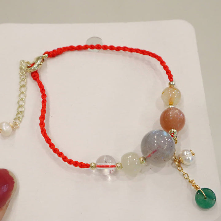 Buddha-Steine, Mondstein, Sonnenstein-Perlen, Peace-Schnalle, Charm-Heilarmband