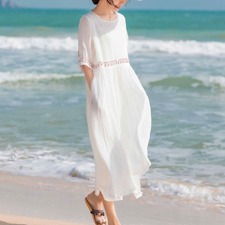 Kurzärmliges Midikleid aus Baumwolle mit Buddha Stones -Stickerei in Volltonfarbe - image 16