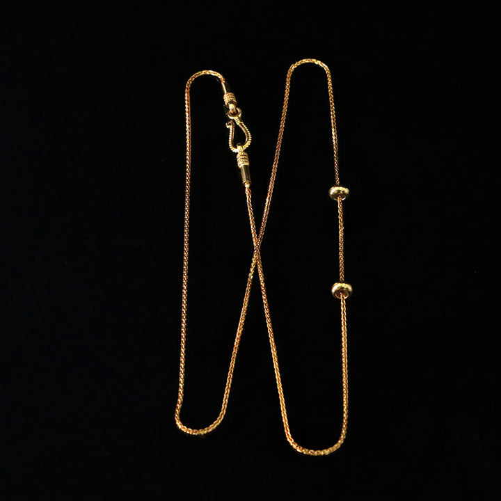 Halskette mit Anhänger aus tibetischem Gelbgold mit Buddha Stones , Jambhala, Gott des Reichtums und Schutz