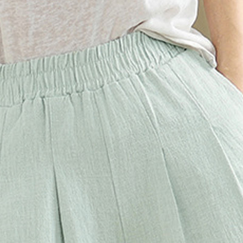 Buddha Stones Lässige, einfarbige, konisch zulaufende, elastische Taillenhose aus Baumwollleinen für Damen mit Taschen - image 34