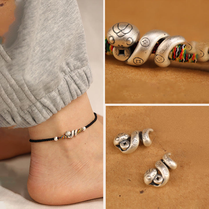 Fußkettchen „Jahr der Schlange“ von Buddha Stones aus 999er Sterlingsilber mit roter Schnur