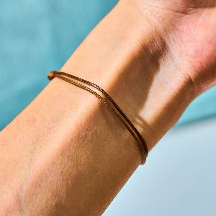 Buddha Stones Natürliches Tahiti-Armband mit schwarzer Perle und Wachsseil