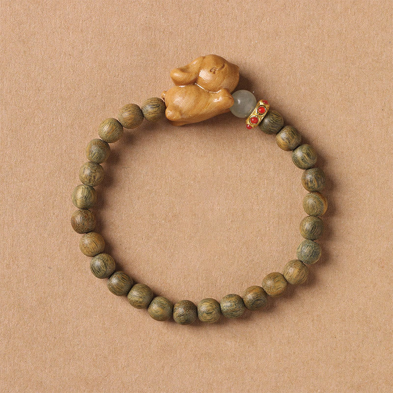 Buddha Stones Grünes Sandelholz Gold Sandelholz Süßes Kaninchen Positives Armband