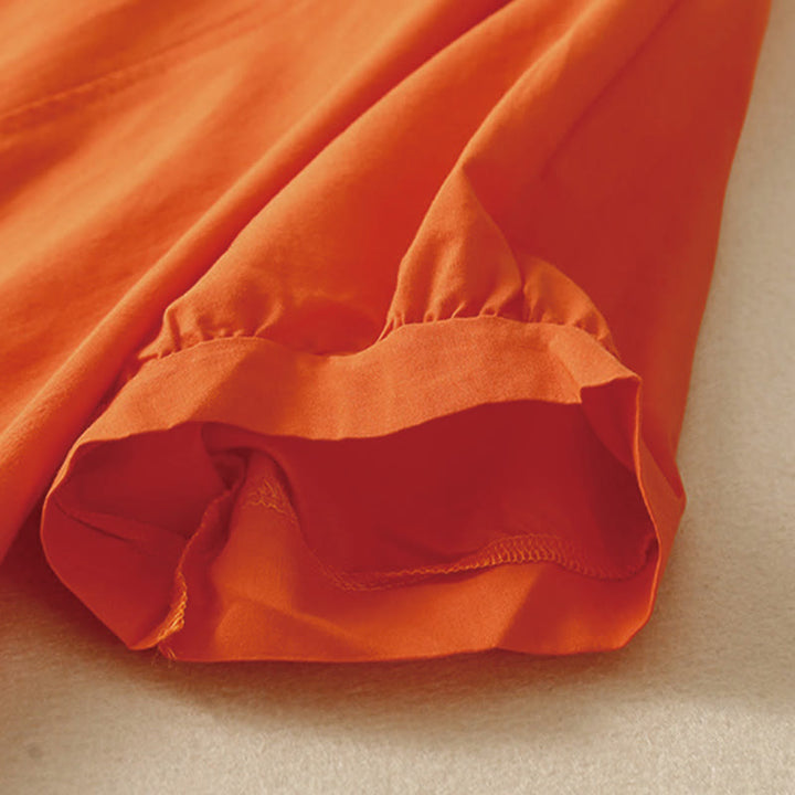 Buddha Stones – Lässiges, reines Farbdesign, kurzärmliges Midikleid aus Baumwolle mit V-Ausschnitt und Taschen - image 5