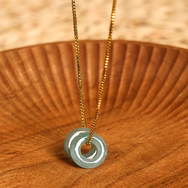 Halskette mit Anhänger aus Jade mit doppelter Friedensschnalle und Wohlstandssymbol von Buddha Stones