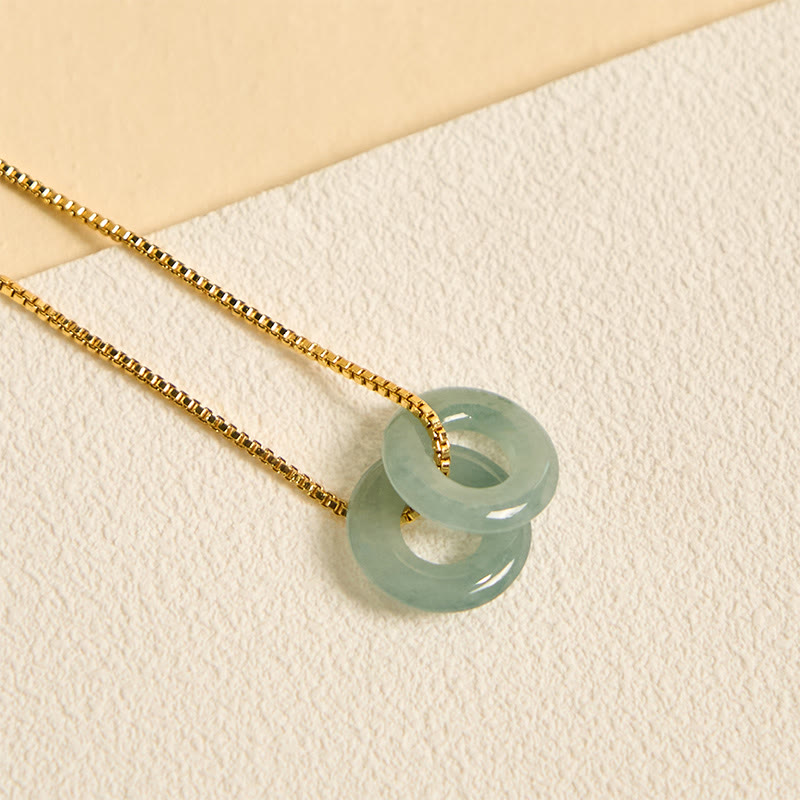 Halskette mit Anhänger aus Jade mit doppelter Friedensschnalle und Wohlstandssymbol von Buddha Stones