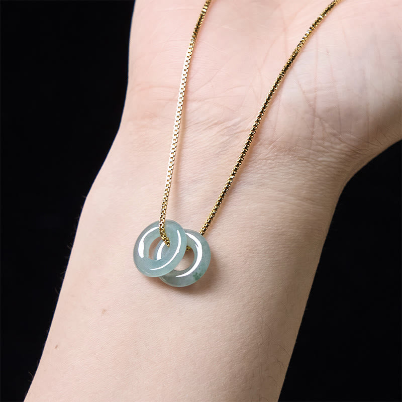 Halskette mit Anhänger aus Jade mit doppelter Friedensschnalle und Wohlstandssymbol von Buddha Stones