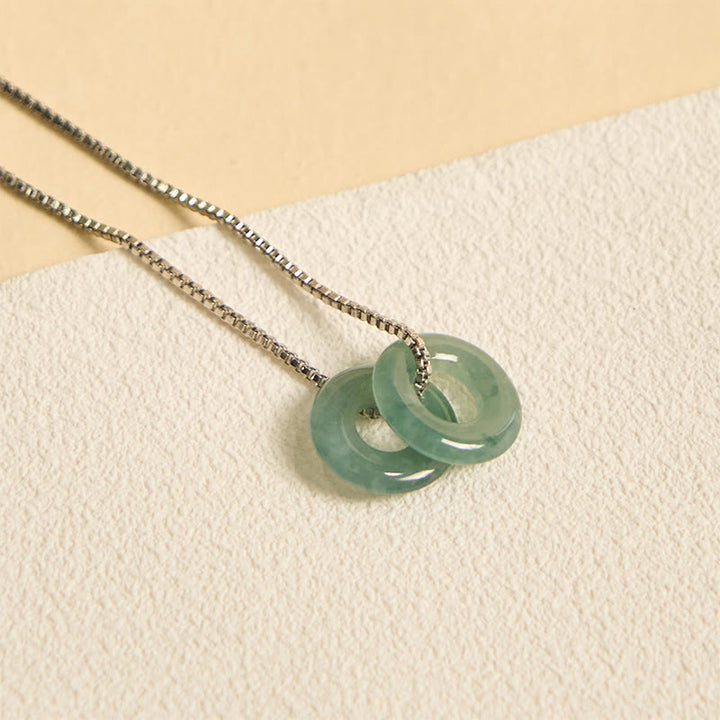 Halskette mit Anhänger aus Jade mit doppelter Friedensschnalle und Wohlstandssymbol von Buddha Stones