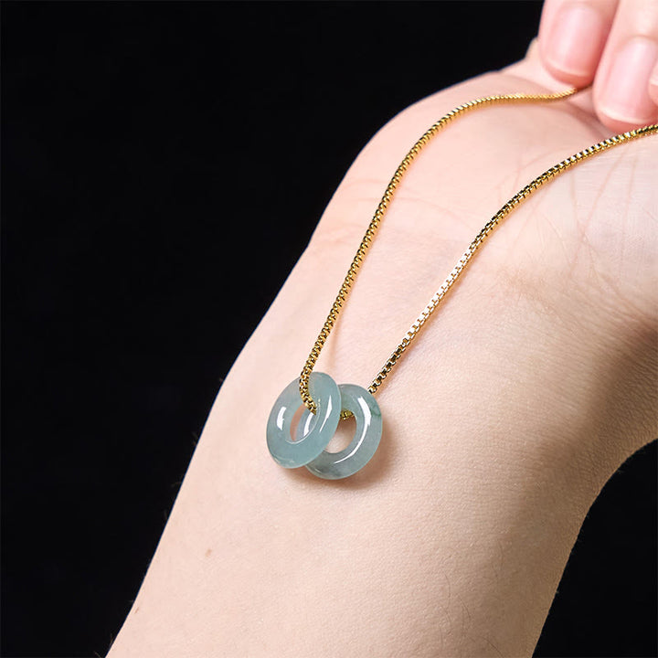 Halskette mit Anhänger aus Jade mit doppelter Friedensschnalle und Wohlstandssymbol von Buddha Stones