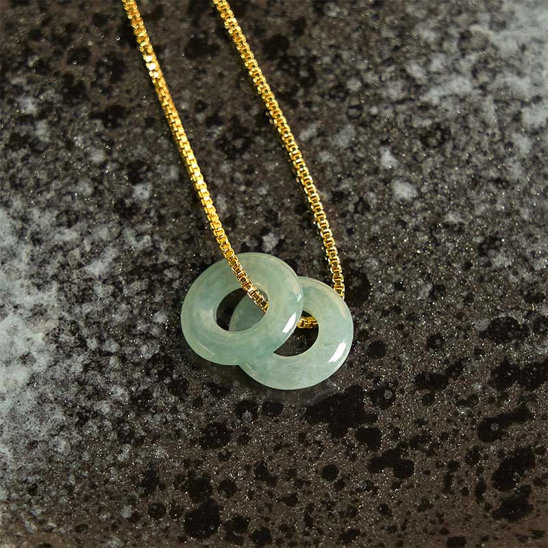 Halskette mit Anhänger aus Jade mit doppelter Friedensschnalle und Wohlstandssymbol von Buddha Stones