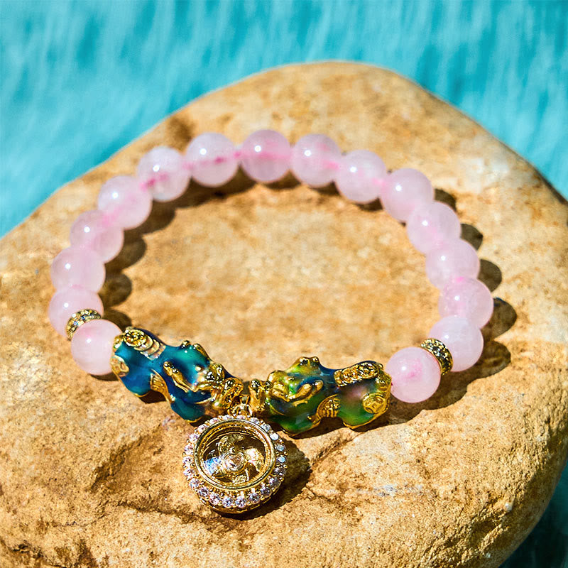 Buddha Stones, rosa Kristall, Farbwechsel, Doppel-PiXiu-Zyklon-Charme, Wärme-Armband