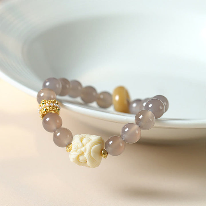 Buddha Stones Bernstein Grau Achat Elfenbein Frucht Vertrauen Armband