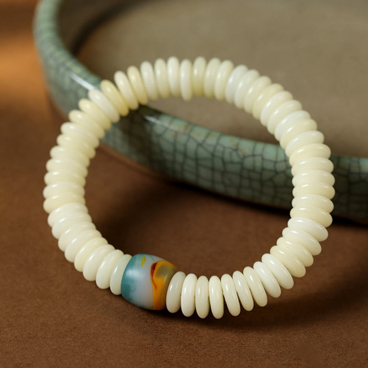 Buddha Stones, natürlicher weißer Bodhi-Samenstein, Weisheitsquaste, Mala-Armband