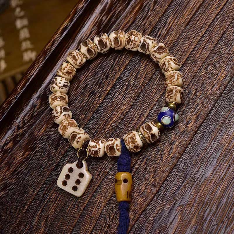 Armband mit Quaste aus tibetischem Kamelknochen und geschnitztem Garuda-Schutz aus Buddha Stones