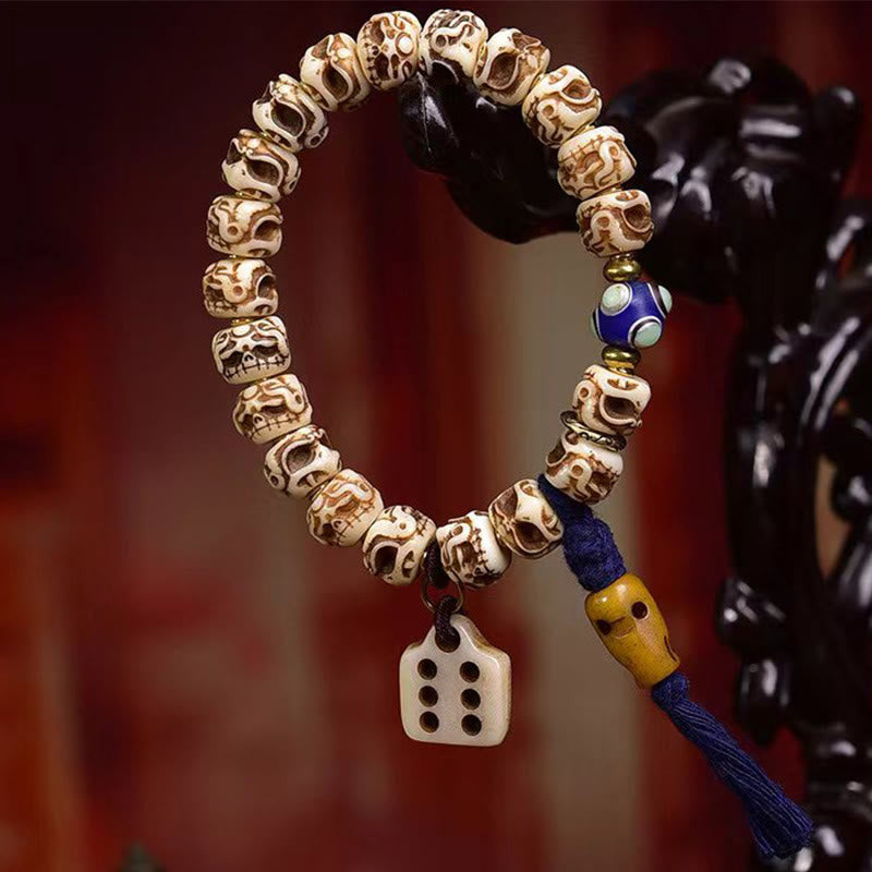 Armband mit Quaste aus tibetischem Kamelknochen und geschnitztem Garuda-Schutz aus Buddha Stones
