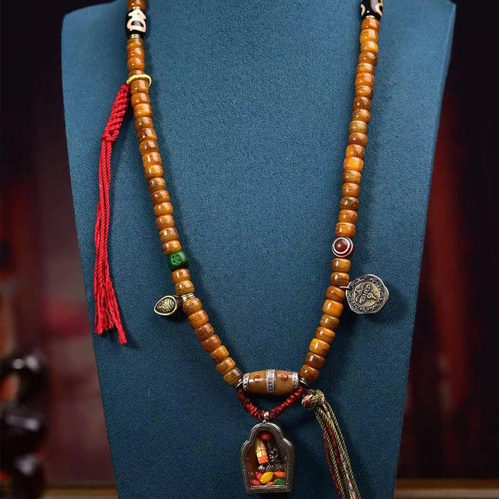 Buddha Stones Tibetische 108 Perlen Kamelknochen Glücksquaste Mala