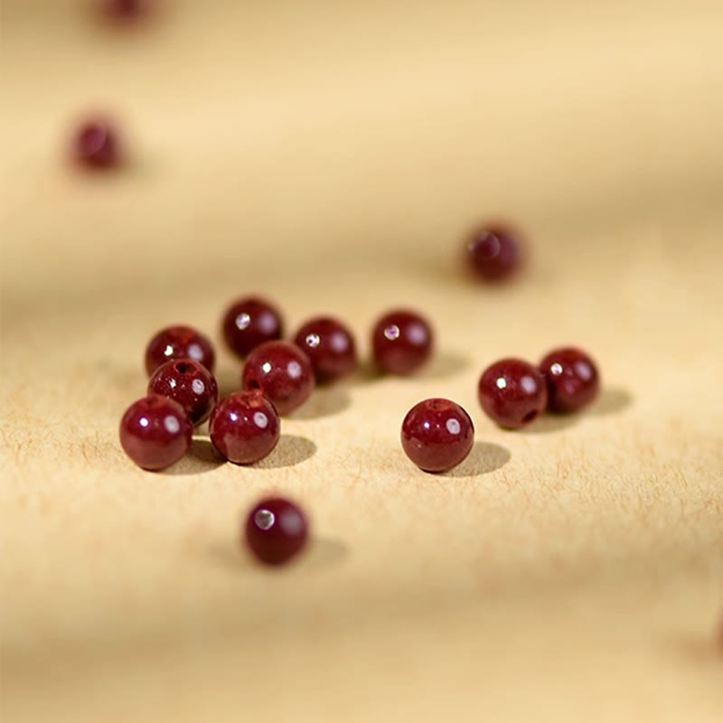 Buddha Stones Zinnoberperlen Pfirsichholz Segensschnur Armband