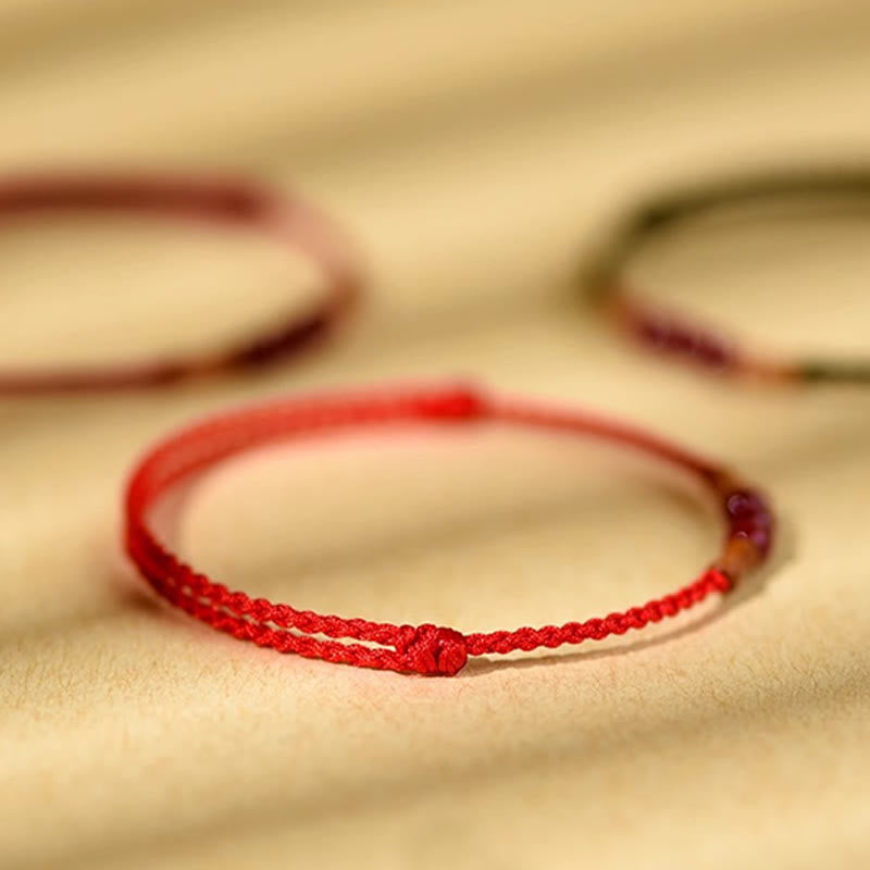 Buddha Stones Zinnoberperlen Pfirsichholz Segensschnur Armband