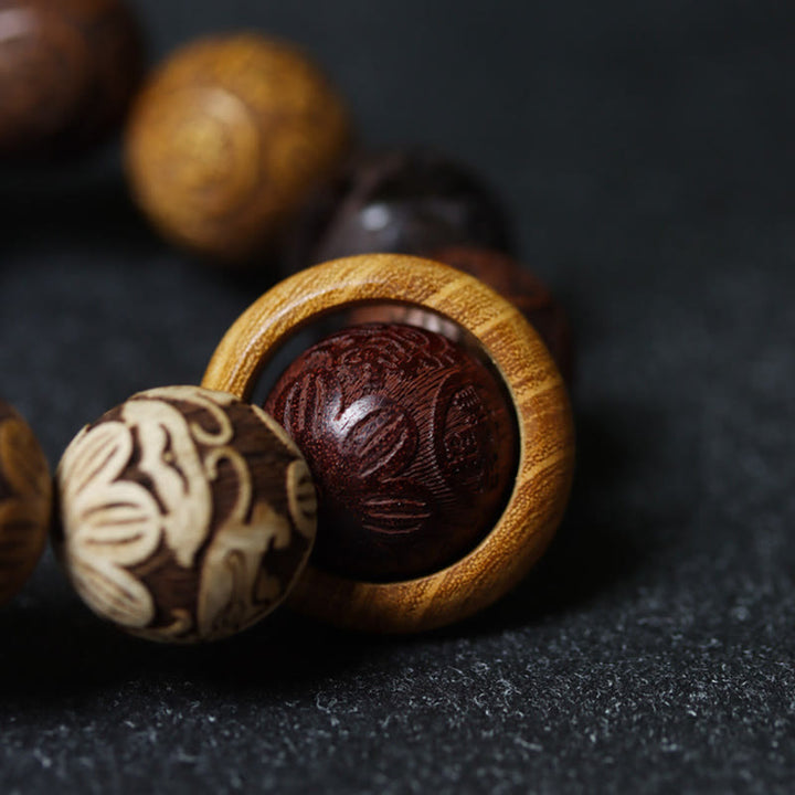 Buddha Stones, die Sandelholz schnitzen, chinesisches Sternzeichen, glückverheißender Drache, Phönix, Fu-Charakter, Heilungsarmband