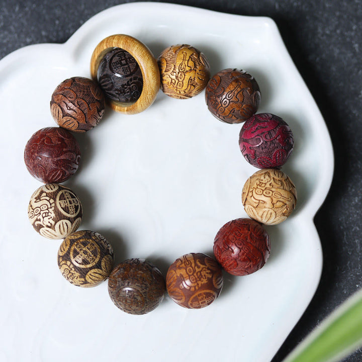 Buddha Stones, die Sandelholz schnitzen, chinesisches Sternzeichen, glückverheißender Drache, Phönix, Fu-Charakter, Heilungsarmband