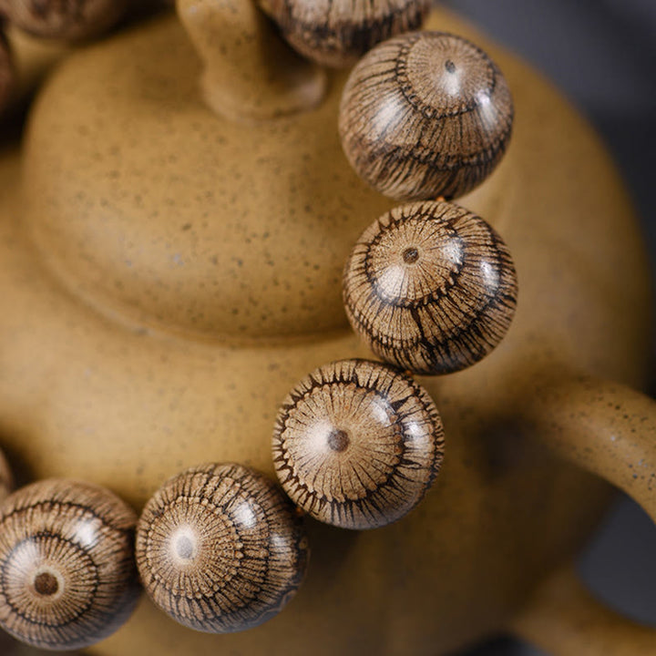 Buddha Stones Gnetum Holzperlen Schutzarmband - image 4