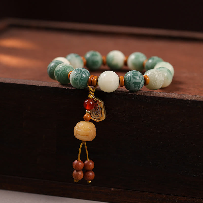 Buddha Stones, Farbverlauf, Bodhi-Samen, Om Mani Padme Hum, geschnitztes Zakiram-Friedensarmband - Bodhi-Samen und Zakiram (Handgelenkumfang: 15–16 cm) - image 1