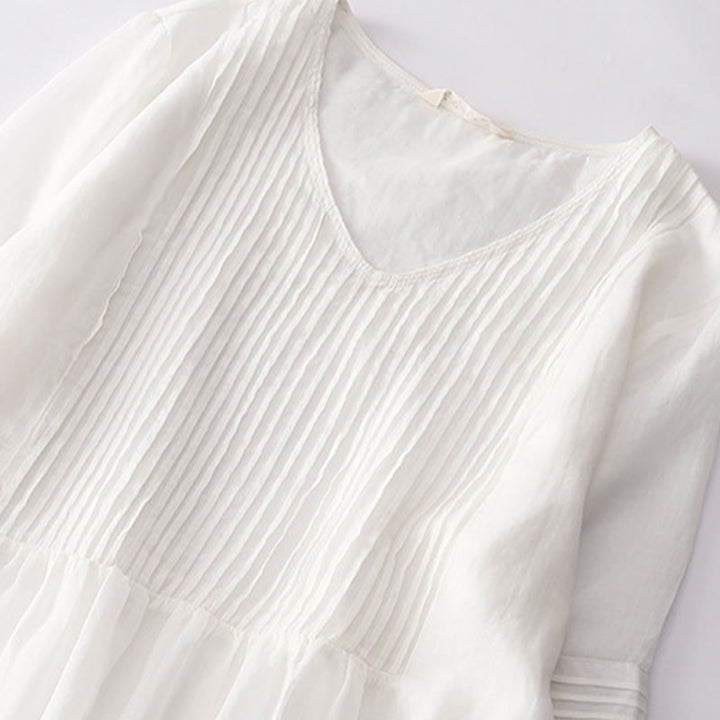 Buddha Stones – Lässiges, schlichtes Midikleid aus Baumwolle mit Akkordeonfalten, V-Ausschnitt, kurzen Ärmeln und Taschen - image 47