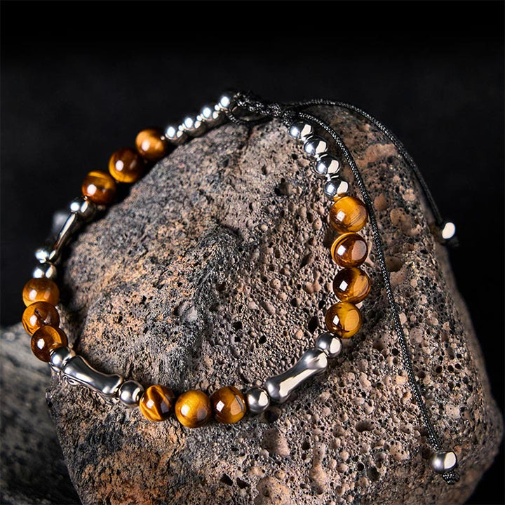 Buddha Stones Niedliches Knochenmuster Tigerauge Mut Perlen Armband - Tigerauge und Titanstahl (Handgelenkumfang: 15–21 cm) - image 1