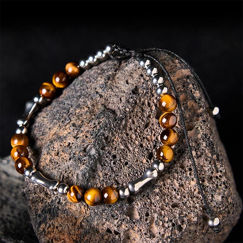 Buddha Stones Niedliches Knochenmuster Tigerauge Mut Perlen Armband - Tigerauge und Titanstahl (Handgelenkumfang: 15–21 cm) - image 1