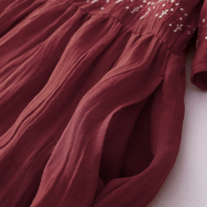 Kurzärmliges Midikleid aus Baumwolle mit Buddha Stones -Stickerei in Volltonfarbe - image 30