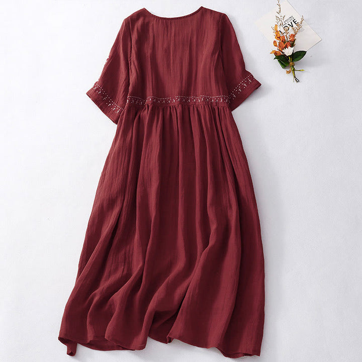 Kurzärmliges Midikleid aus Baumwolle mit Buddha Stones -Stickerei in Volltonfarbe - image 18