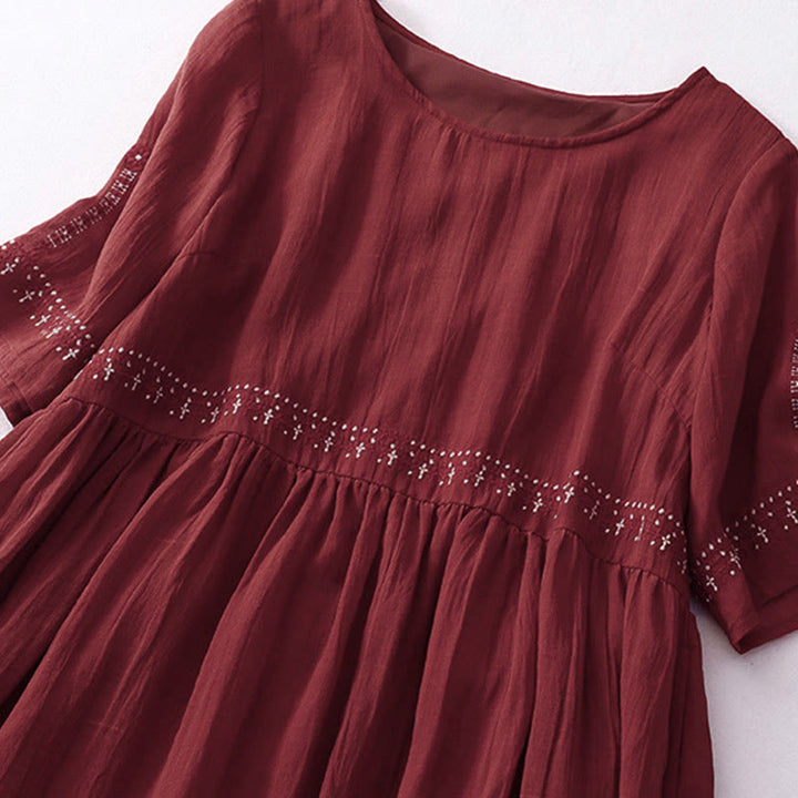 Kurzärmliges Midikleid aus Baumwolle mit Buddha Stones -Stickerei in Volltonfarbe - image 28