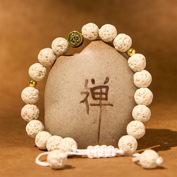 Buddha Stones, weißer Lavastein, Om-Symbol, heilendes, ruhiges Armband - image 1