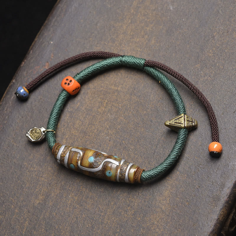 Handgefertigtes tibetisches Neun-Augen-Dzi-Perlen-Schutzseilarmband aus Buddha Stones - Grünes Seil und Neun-Augen-Dzi-Perle (Handgelenkumfang: 16–20 cm) - image 7