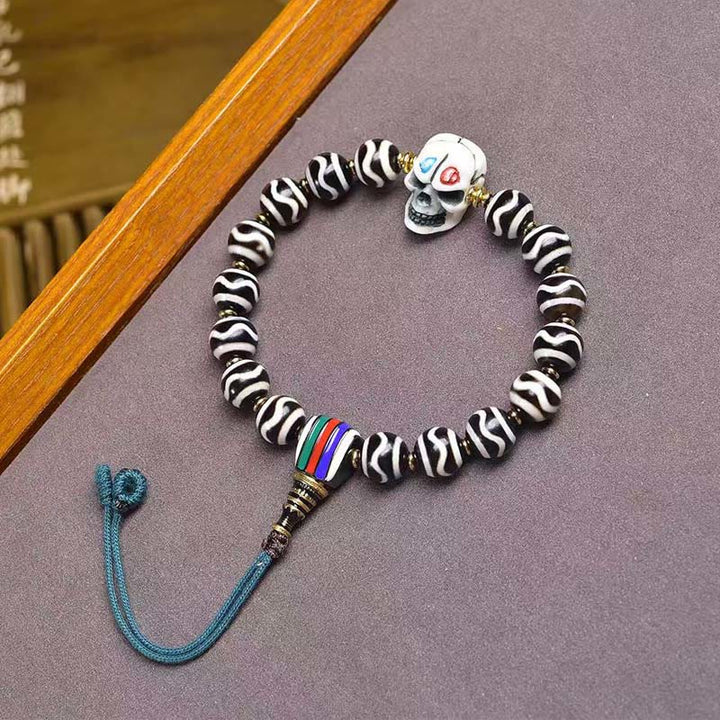 Buddha Stones Tibetische Dzi-Perle Der Herr des Leichenwald-Schutzarmband - Dzi-Perle (Handgelenkumfang: 16–17 cm) - image 0