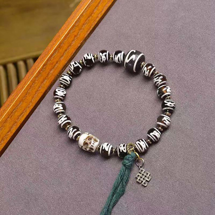 Buddha Stones Tibetischer Dzi-Perlenschädel Der Herr des Leichenwaldes Reichtumsarmband - Schädel (Handgelenkumfang: 16–17 cm) - image 0