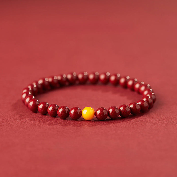 Buddha Stones Natürliches Zinnober-Bernstein-Ruhearmband - 6mm Zinnober - image 0