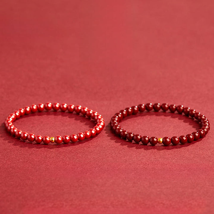 Buddha Stones Natürliches Zinnober-Bernstein-Ruhearmband - image 4