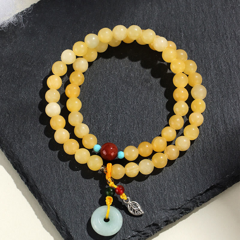 Buddha Stones Topas Peace Buckle Doppelwickel-Design Reichtumsarmband - Topas (Handgelenkumfang: 13–15 cm) - image 0