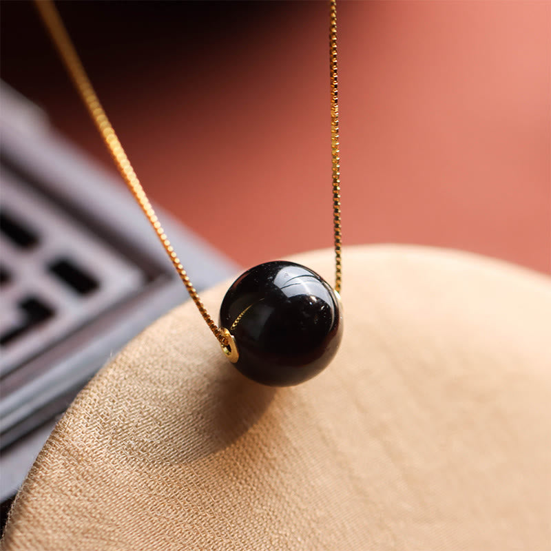 Buddha Stones Halskette mit Anhänger „Confidence Focus“ aus 925er Sterlingsilber mit runder Bernsteinperle - Bernstein & 925 Sterling Silber - image 0