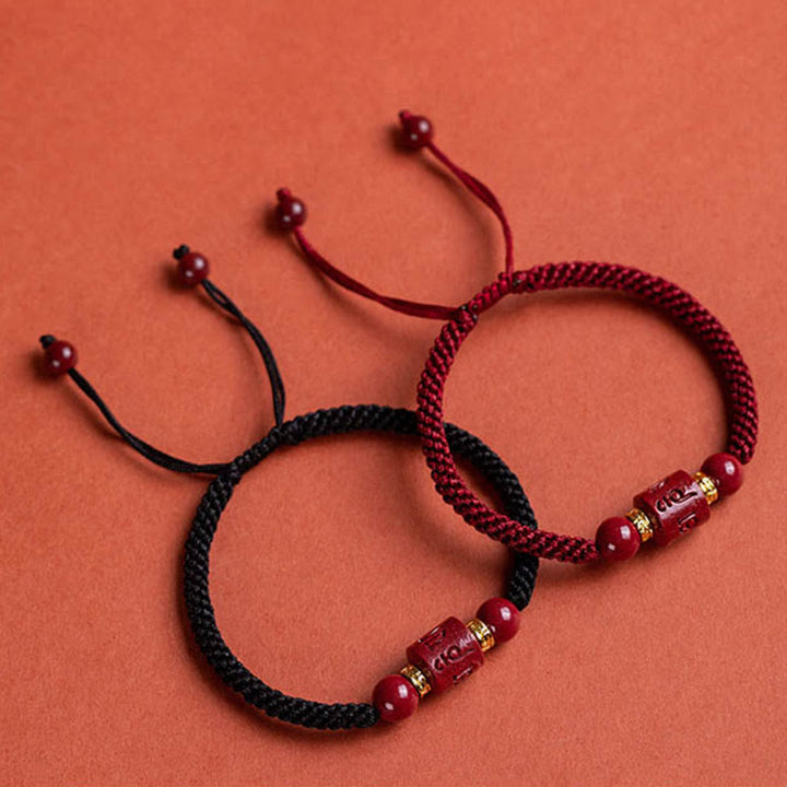 Buddha Stones Tibet Zinnober Om Mani Padme Hum geflochtenes Armband mit Gravur „Segen“.