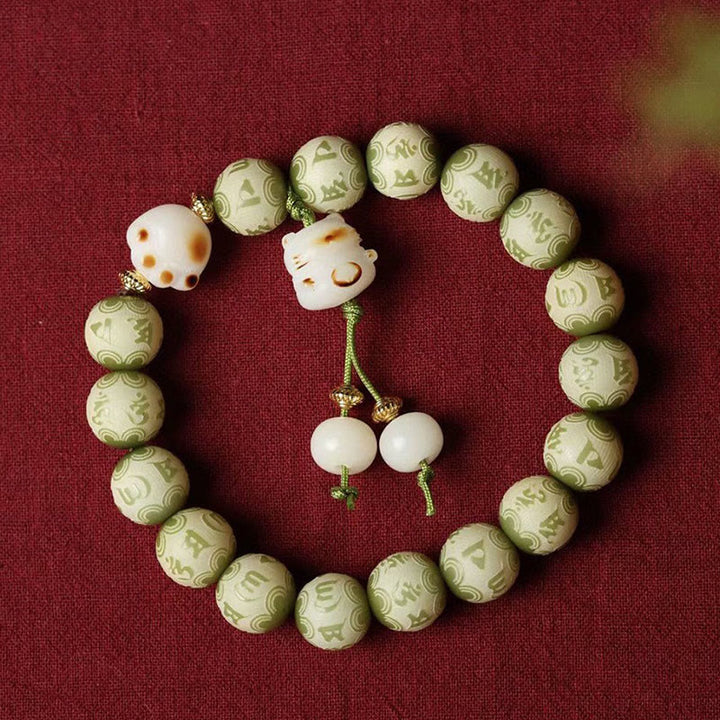 Buddha Stones, grüner Bodhi-Samen, Katzenpfote, Om Mani Padme Hum, graviertes Weisheitsarmband - image 3