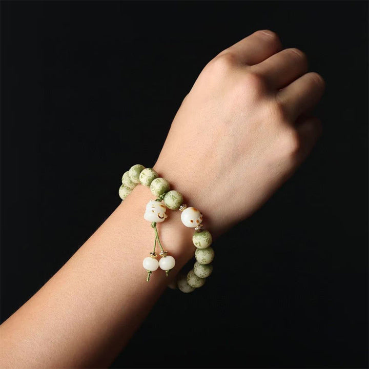 Buddha Stones, grüner Bodhi-Samen, Katzenpfote, Om Mani Padme Hum, graviertes Weisheitsarmband - image 6