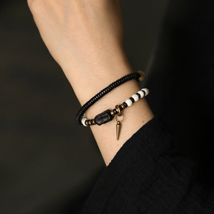 Buddha Stones Knochenperlen Ebenholz Kupfer Stärke Paar Armband