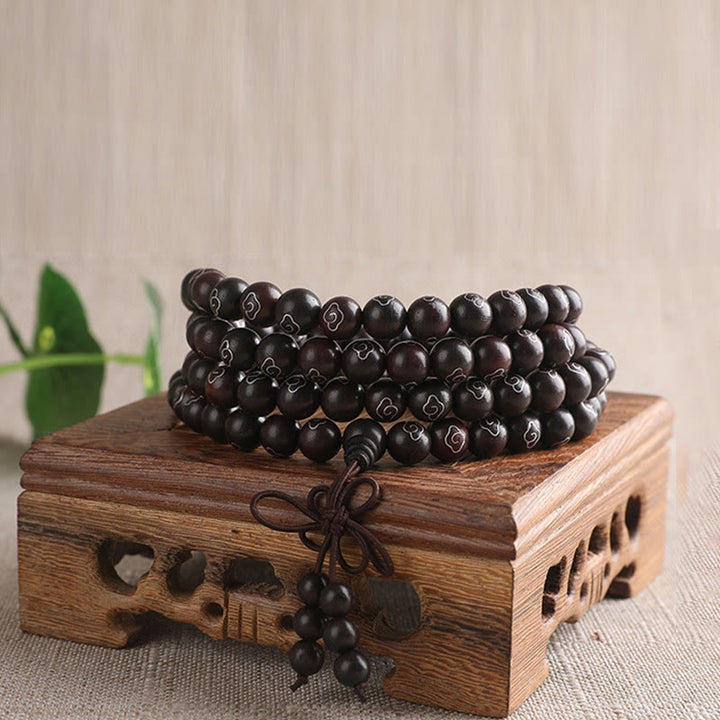 Buddha Stones, 925er-Sterlingsilber, eingelegtes kleines Blatt, rotes Sandelholz, Om Mani Padme Hum-Charakter, glückverheißende Wolken, Schutzarmband