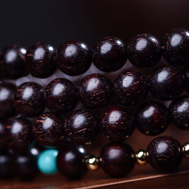 Buddha Stones 108 Mala-Perlen, tibetisches kleines Blatt, rotes Sandelholz, Lotus-Balance-Armband