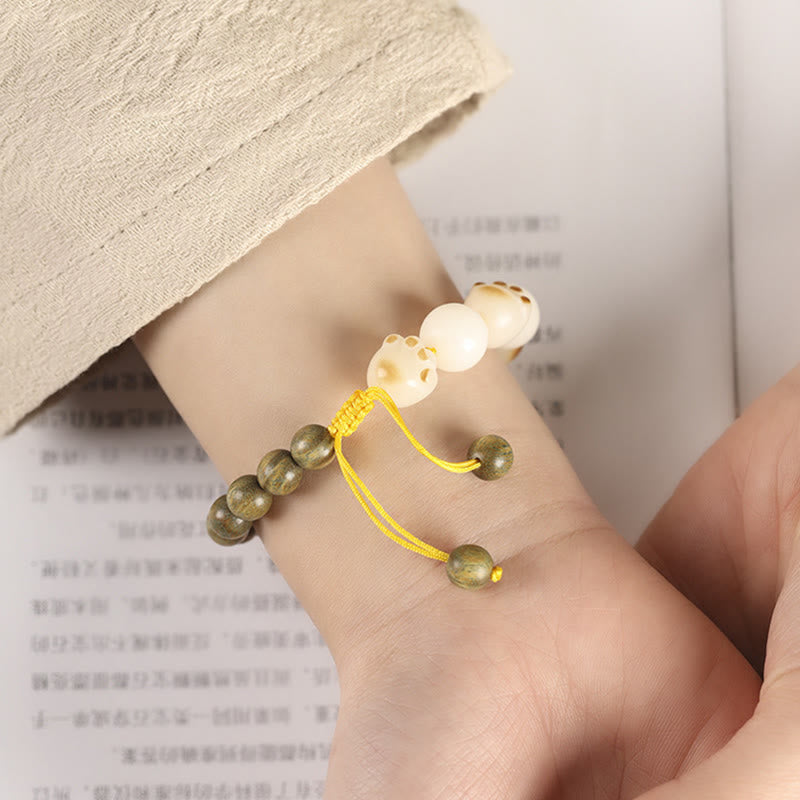 Buddha Stones natürliches grünes Sandelholz-Bodhi-Samen-Katzenpfoten-Klauen-Heilungsarmband - image 5