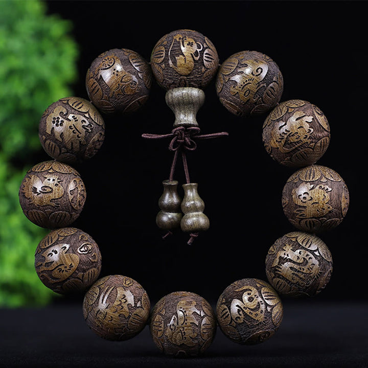 Buddha Stones Chinesisches Sternzeichen Palisander Ebenholz Kupfermünze PiXiu Geschnitztes Wärmearmband